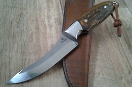 A premium Capreolus in RWL-34 with 416 bolsters and bocote scales with a tapered tang