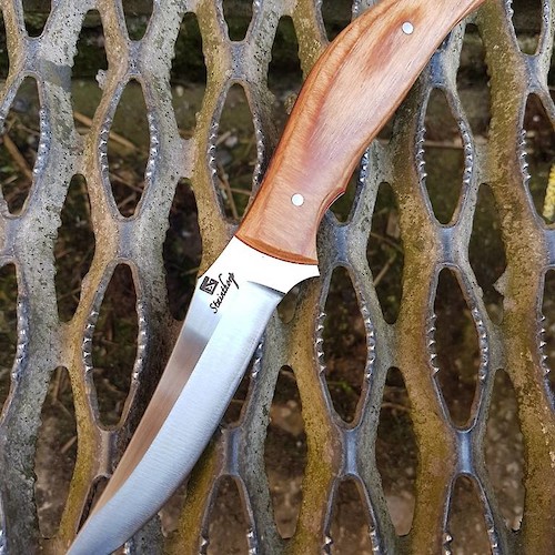 Convex ground trailing point hunter in 14C28N and Permali densified wood. Convex ground trailing point hunter in 14C28N and Permali densified wood.